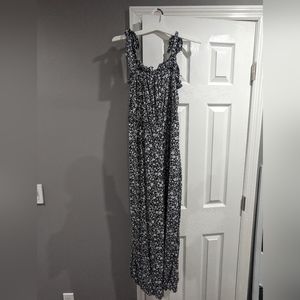 Francesca's women's small black with white floral print jumpsuit.